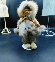 9" FUR CLAD PORCELAIN FACE & HANDS NATIVE DOLL OUTFIT, FUR TRIM, BEADS, MOCCS, STAND